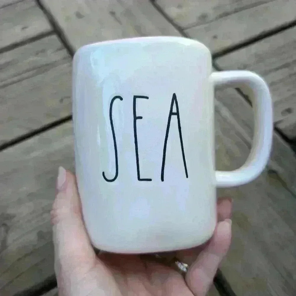 Rae Dunn sea mug with blue interior